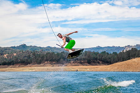 man wakeboarding during daytime thumbnail