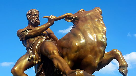 man riding bull statue thumbnail