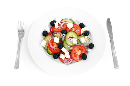 closeup photo of salad with dressing on white ceramic plate thumbnail