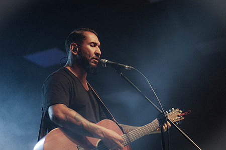 man playing guitar thumbnail