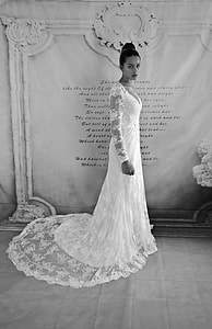 photo of woman in white floral laced long-sleeved bridal gown thumbnail