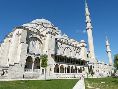 beige and grey mosque beside garden thumbnail
