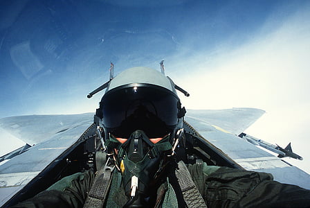 pilot riding plane during daytime thumbnail