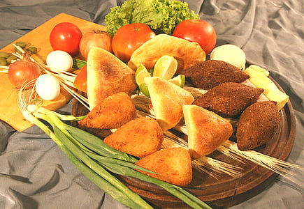 breads and vegetables on tray thumbnail