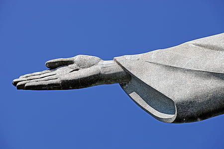 close-up photo of Jesus Christ statue's right hand thumbnail