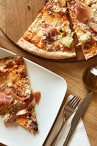 Pizza with Prosciutto on the white plate thumbnail