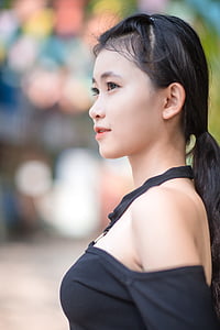 woman wearing white off-shoulder top thumbnail