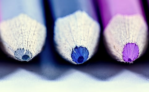 focus photography of gray, blue, and purple color pencils thumbnail