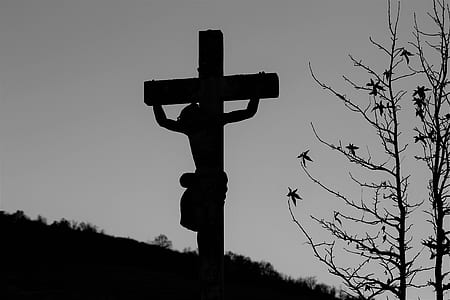 grayscale photo of crucified person thumbnail