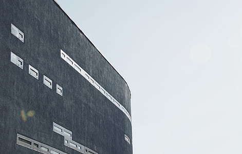 black concrete building during daytime thumbnail