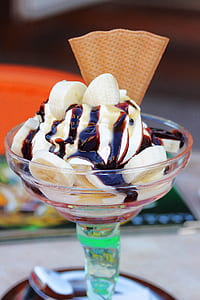 ice cream with biscuit served on clear dessert glass thumbnail