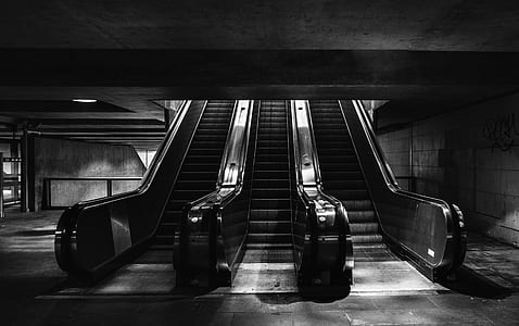 grayscale photography of escalator thumbnail