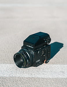 black Bronica camera on concrete floor thumbnail