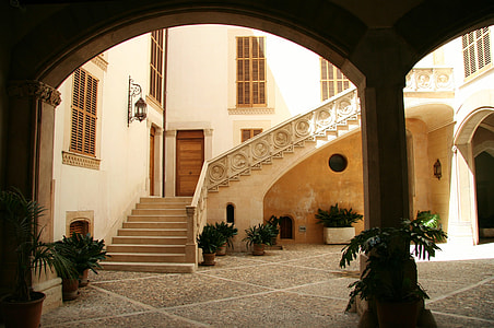 photo of beige staircase inside yellow and brown room thumbnail