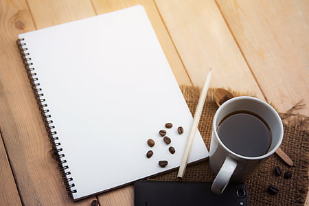 coffee cup and white notebook thumbnail