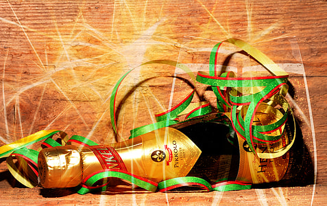brown and black wine bottle on brown surface thumbnail