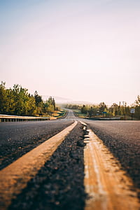 gray asphalt road during daytime thumbnail