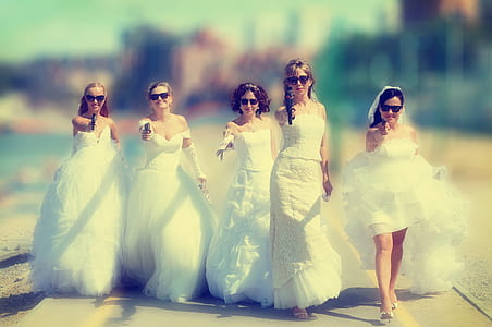 women in bridal gown tilt shift lens photography thumbnail