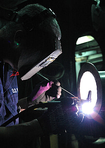 welder low-light photography thumbnail
