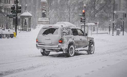 grey SUV with snow cap thumbnail