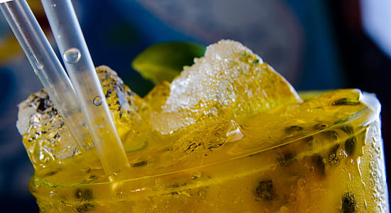 clear drinking glass filled with ice close-up photography thumbnail
