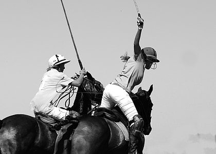 two women riding horses thumbnail