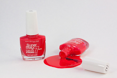 red Maybelline nail polish spilling thumbnail