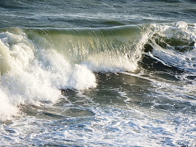 Arc of a wave breaking on the ocean thumbnail