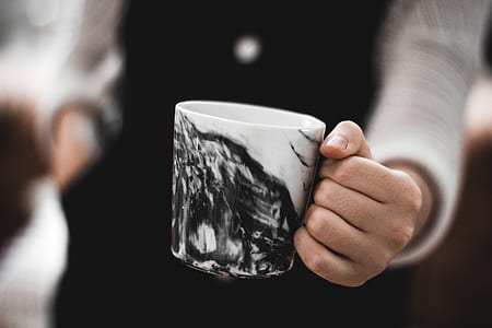 focus photography of black and white mountain-printed mug thumbnail