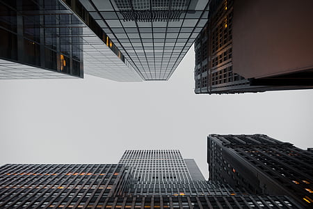 low-angle photo of city high rise buildings thumbnail