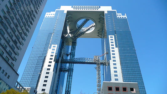 low-angle photography of laminated glass high-rise building thumbnail