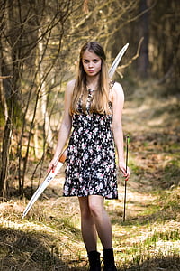 woman holding bow and arrow thumbnail