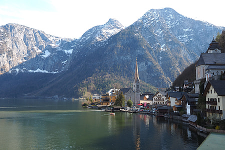 body of water and village during daytime thumbnail