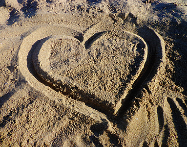 sand with heart shape calligraphy thumbnail