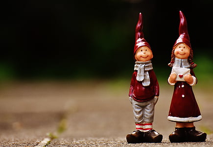 boy and girl wearing red top ceramic figurines thumbnail
