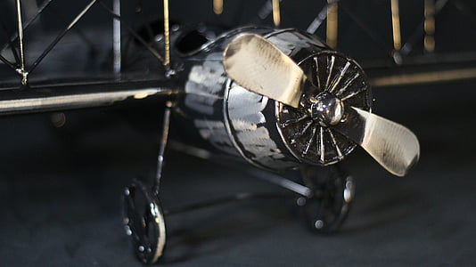 gray propeller plane die-cast model thumbnail