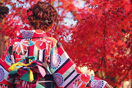 woman wearing red and purple floral long sleeve top thumbnail