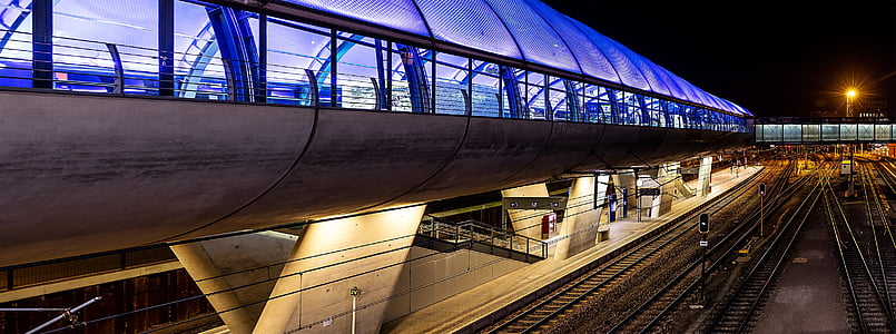 brown railways near tunnel subway at night thumbnail