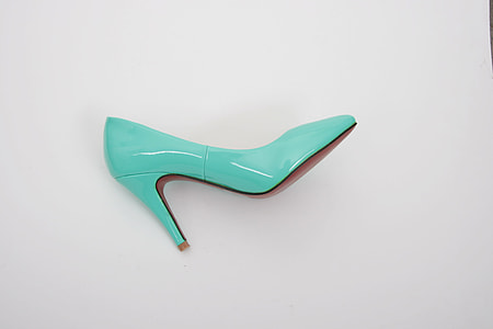 unpaired teal patent leather platform stiletto heel on white surface thumbnail