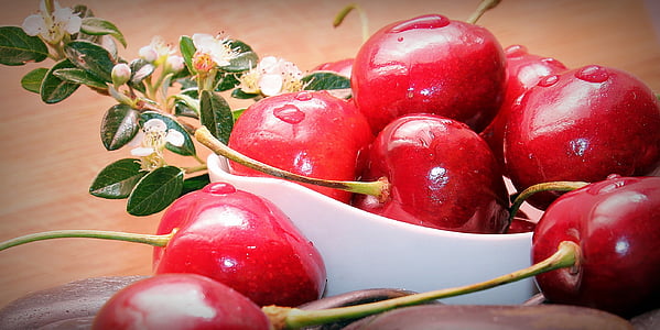 closeup photo of bunch of red cherries thumbnail
