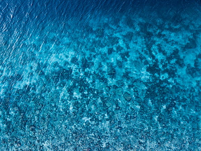 aerial photography of calm water thumbnail