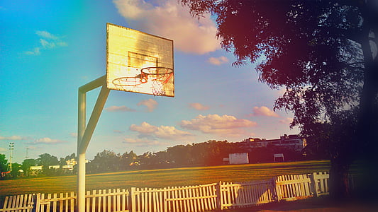 white basketball hoop near fence thumbnail