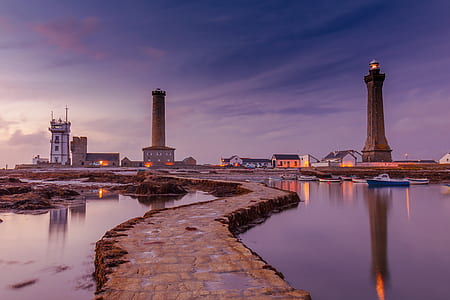 landscape photo of building near body of water thumbnail