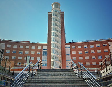 brown and white concrete building thumbnail