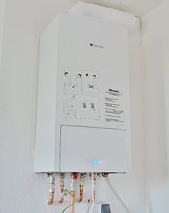 white shower water heater on wall thumbnail