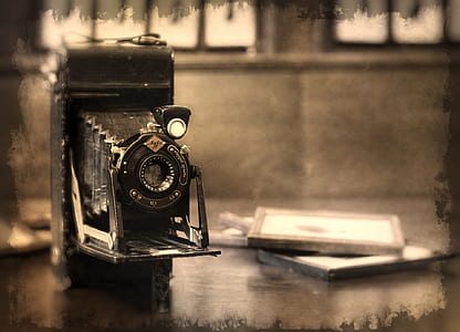 black vintage telescopic camera thumbnail