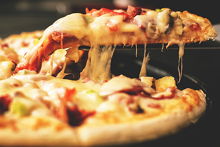 Pizza being served thumbnail
