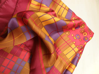 plaid comforter on white surface thumbnail