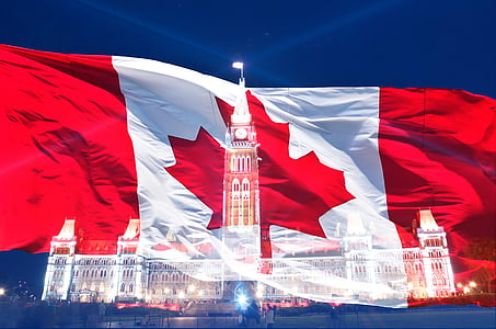 flag of Canada and lighted mansion thumbnail