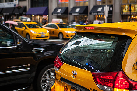 Street shot of the busy traffic in Manhattan, New York City, as always, taxis dominate the road thumbnail